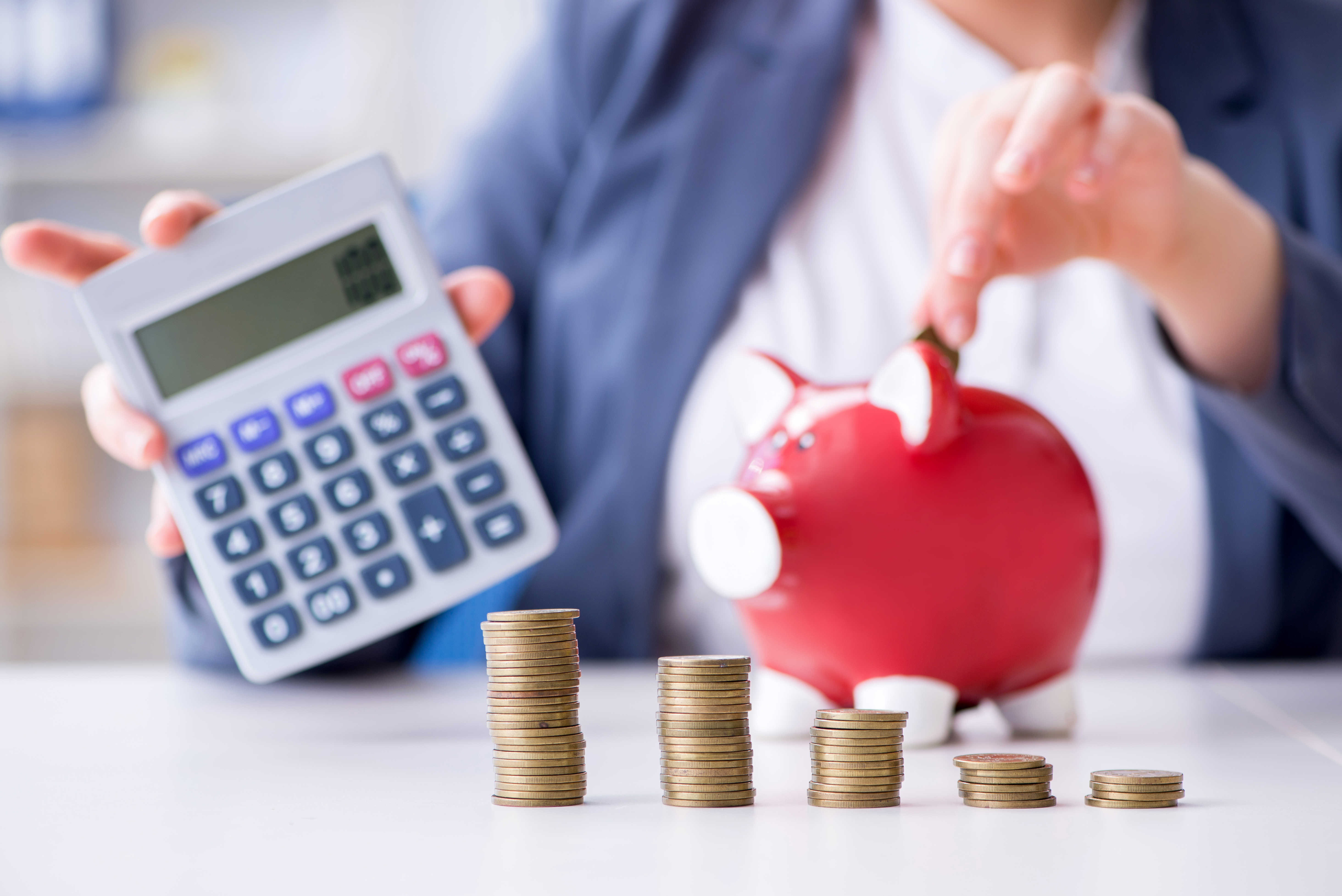 Penge, sparegris og lommeregner